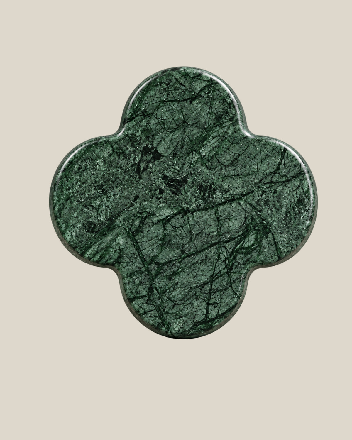 ALHAMBRA Door Knob by ATOMS in Forest Green, front view of the four-lobed natural stone face.