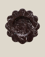 ATOMS Mini Sun Tray in Rosso Levante, near-top view on BONE background; 12.5 cm diameter and 2 cm thick.
