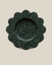 ATOMS Mini Sun Tray in Verde Marble, near-top view on BONE background; 12.5 cm diameter and 2 cm thick.