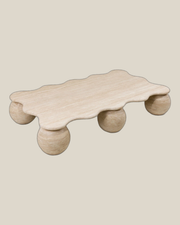MIRA Large Beige Travertine coffee table — product view on Bone background