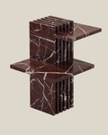 PIANO Side Table by CARVINGS in Rosso Levante Marble on a BONE background.