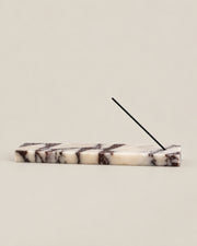 Low front view of LINEA Incense Holder in Calacatta Viola marble.