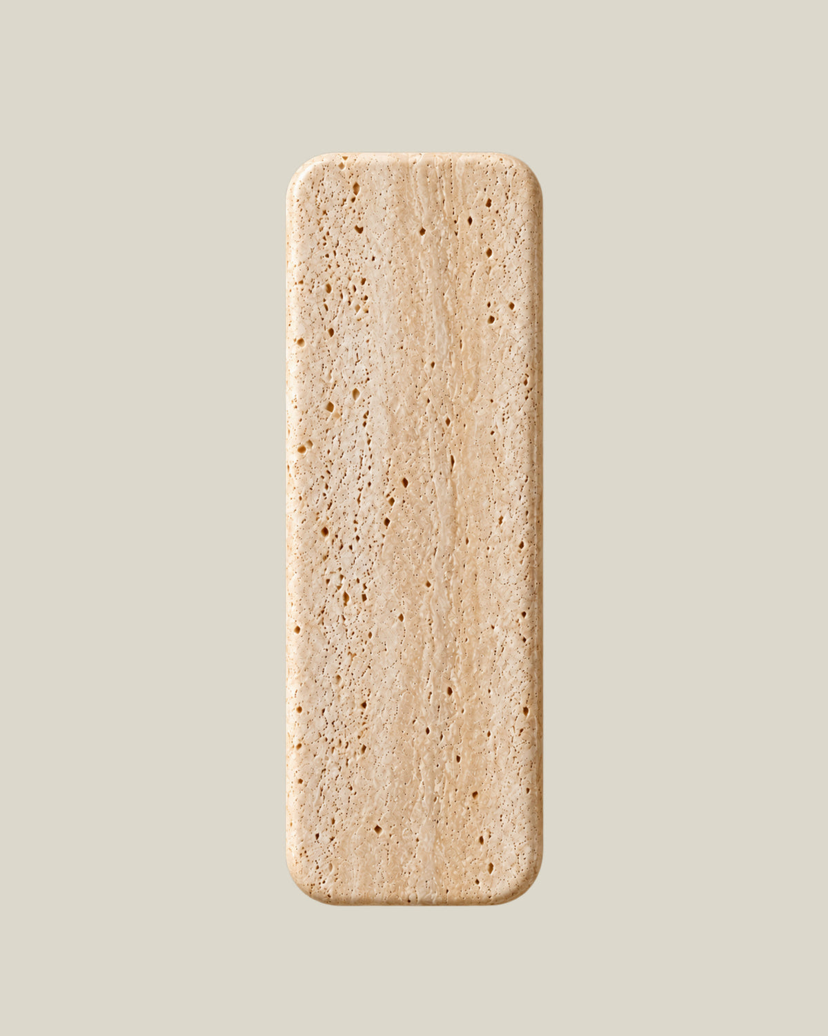 Tower Door Knob by ATOMS in Beige, front view of the rounded rectangular natural stone door pull; one stone pull per purchase.