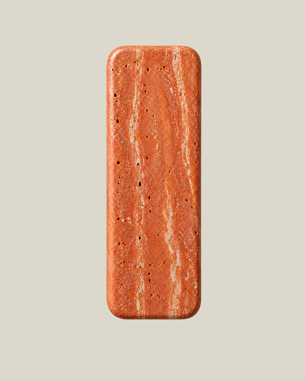 Tower Door Knob by ATOMS in Terracotta Red, front view of the rounded rectangular natural stone door pull; one stone pull per purchase.