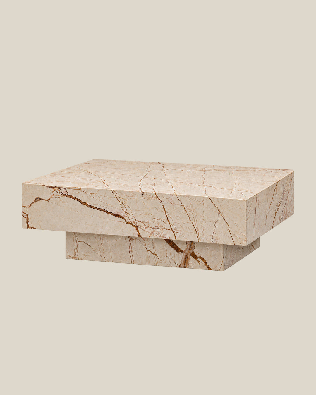 BUTTER coffee table by CARVINGS in Sofita Beige Marble, on a BONE background, right view.