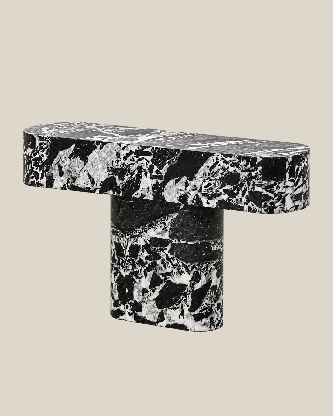 BUTTER console table by CARVINGS in Grand Antique Black Marble, on a BONE background, right view.