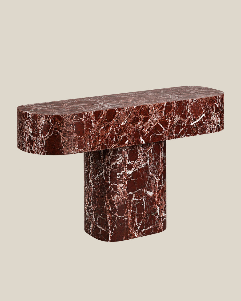 BUTTER console table by CARVINGS in Rosso Levante Marble, on a BONE background, left view.