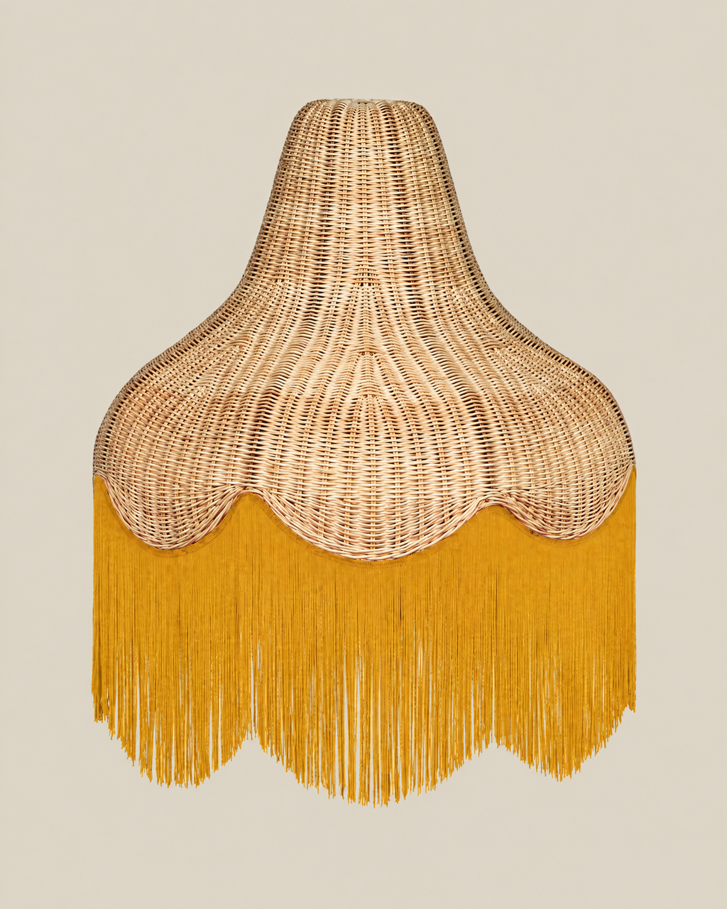 LA LUZ Classic Cone Bamboo Lampshade with mustard yellow fringe on a bone background, portrait 4:5
