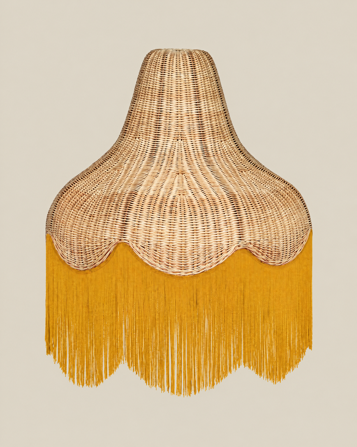 LA LUZ Classic Cone Bamboo Lampshade with mustard yellow fringe on a bone background, portrait 4:5