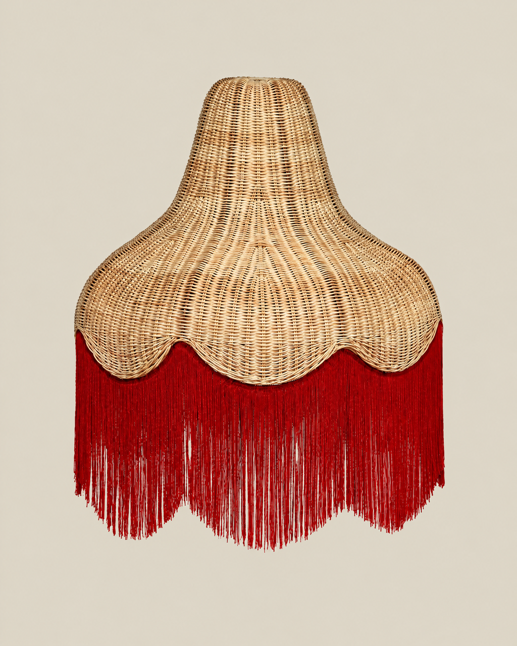LA LUZ Classic Cone Bamboo Lampshade with red fringe on a bone background, portrait 4:5