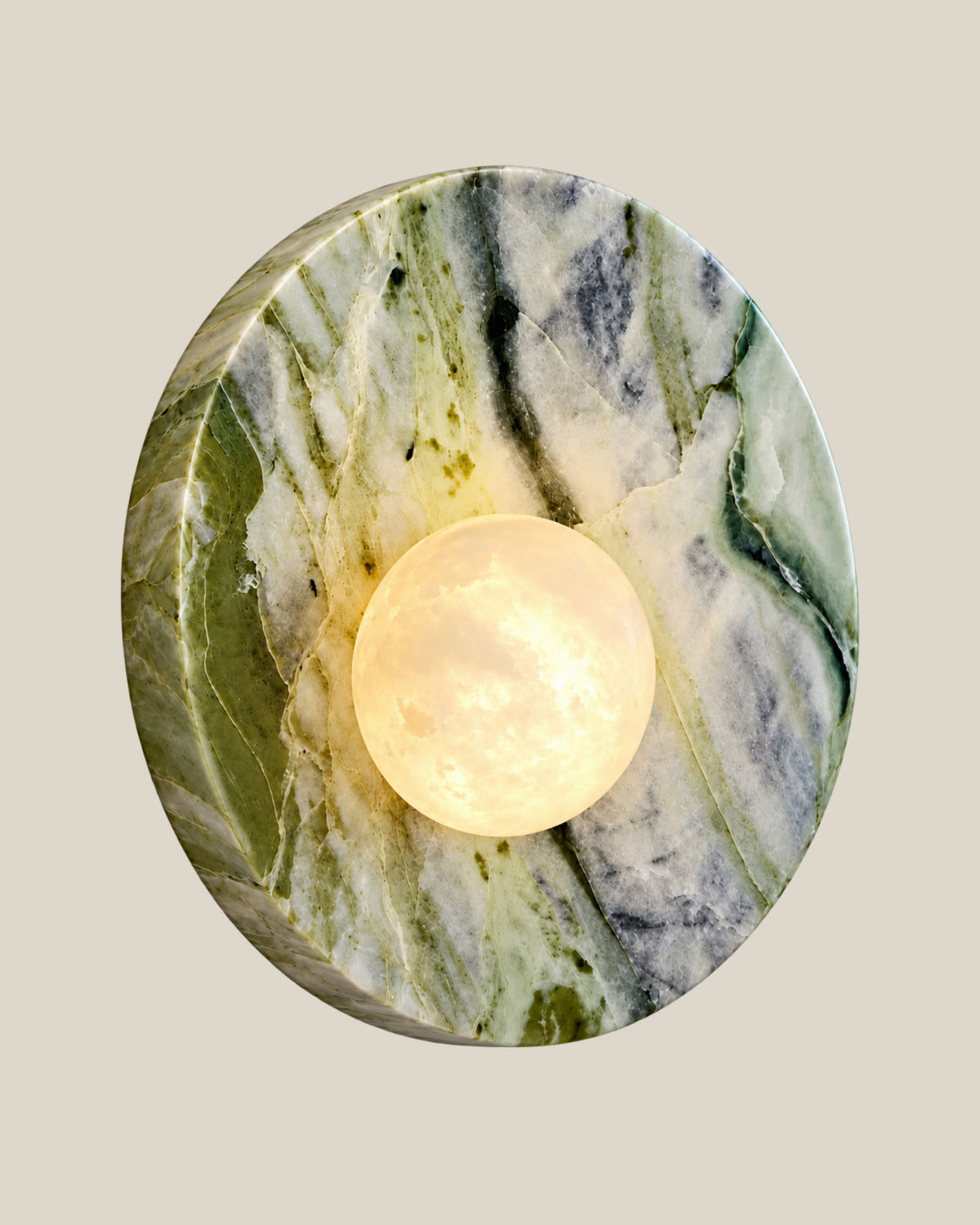 Left angled view of LUNETTE Wall Light showing natural green, cream and grey marble veining.