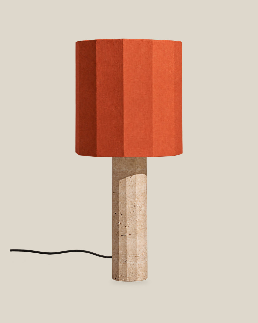 Roma Table Lamp, Large Faceted, Travertine Beige + Terracotta, on a bone background.