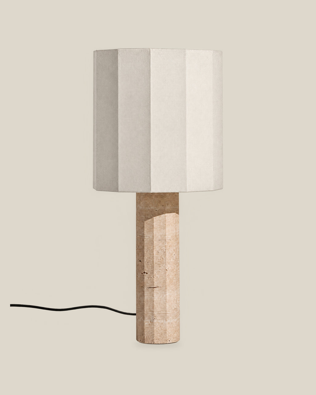 Roma Table Lamp, Large Faceted, Travertine Beige + White, on a bone background.
