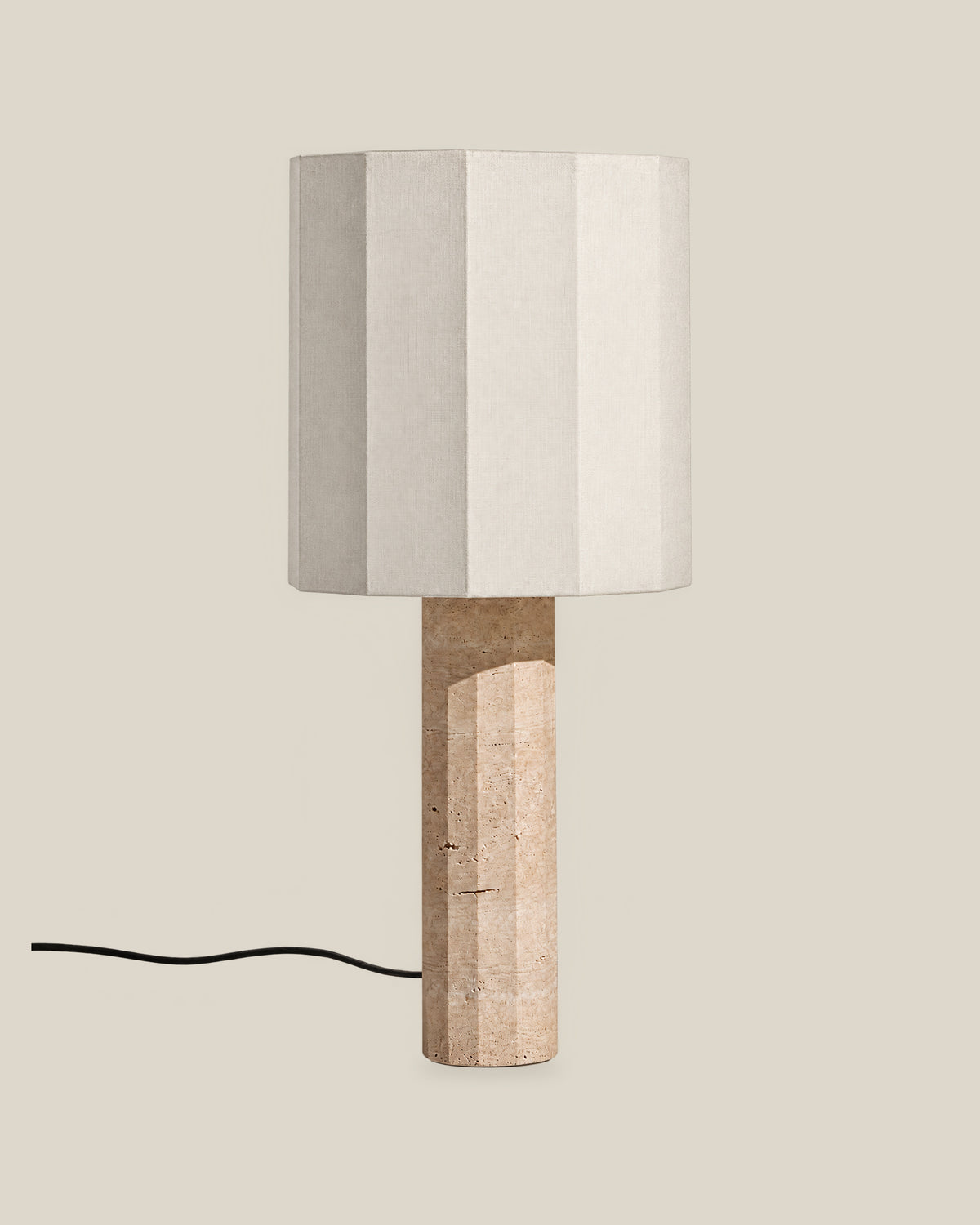 Roma Table Lamp, Large Faceted, Travertine Beige + White, on a bone background.