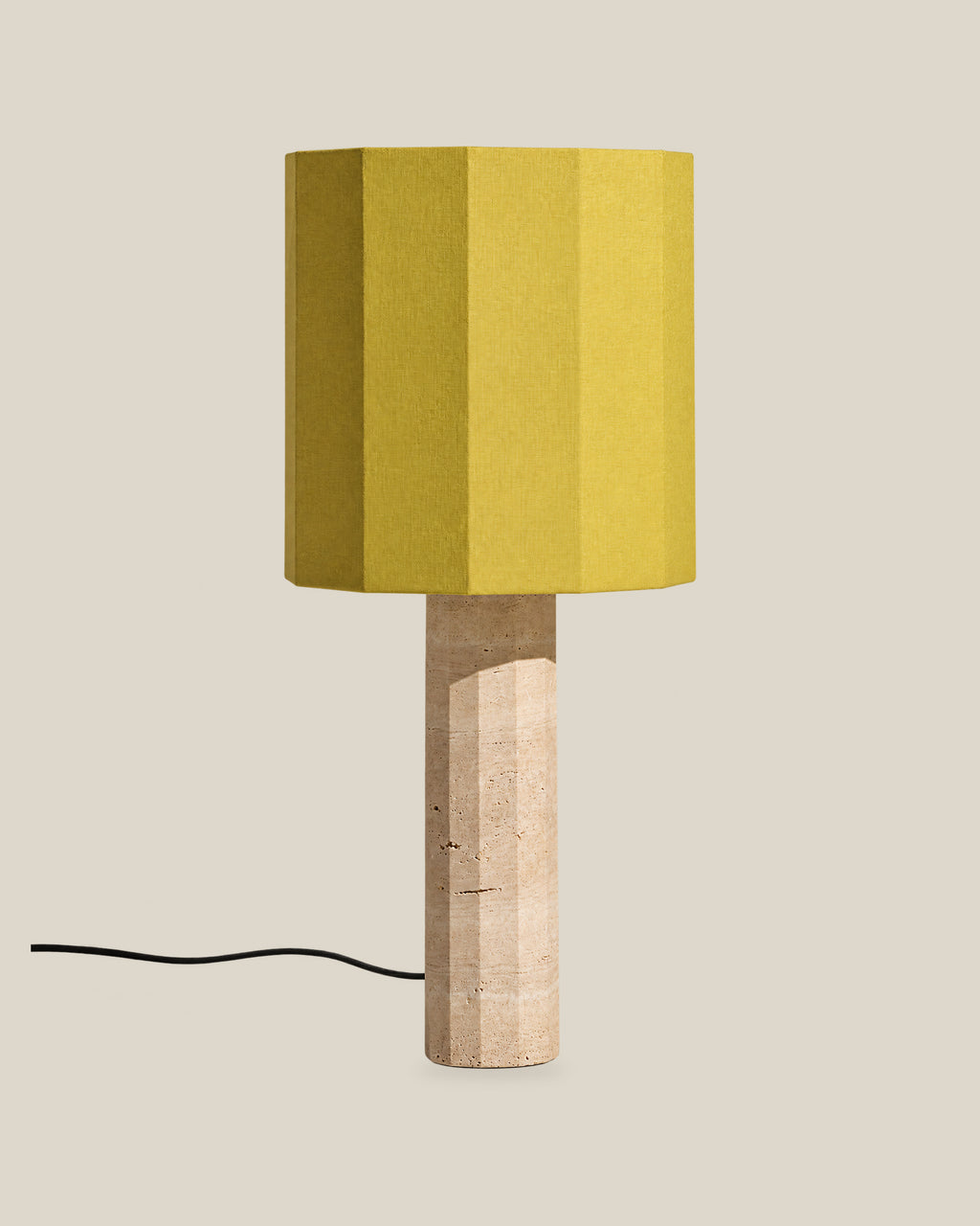 Roma Table Lamp, Large Faceted, Travertine Beige + Yellow, on a bone background.
