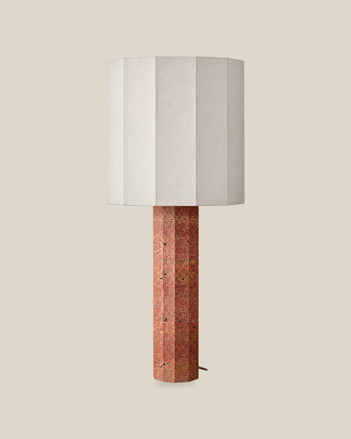 Roma Table Lamp, Large Faceted, Travertine Red + White, front hero view on bone background.