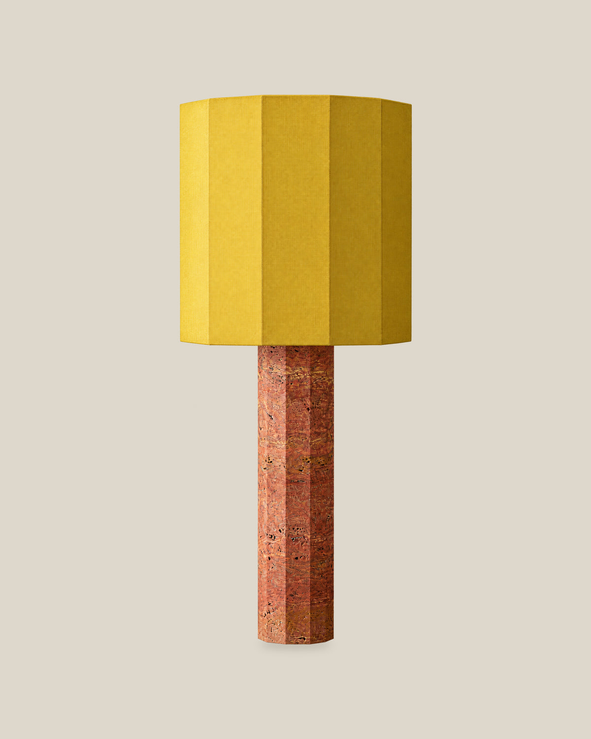 Roma Table Lamp, Large Faceted, Travertine Red + Yellow, front hero view on bone background.