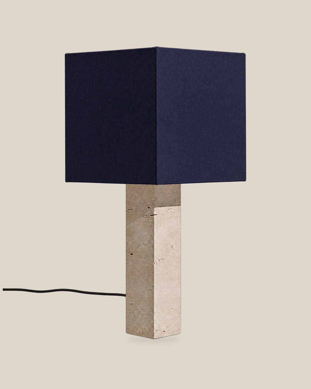 Roma Table Lamp, Large Square, Travertine Beige + Dark Blue, on a bone background.