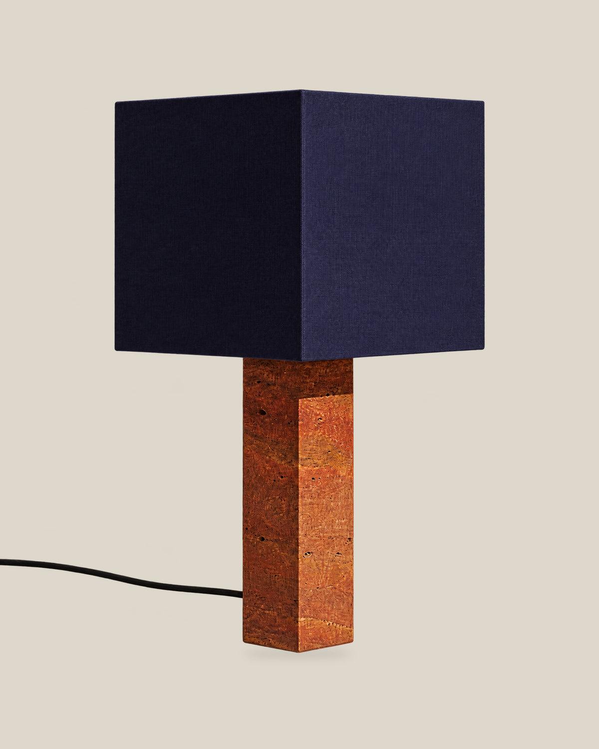 Roma Table Lamp, Large Square, Travertine Red + Dark Blue, on a bone background.