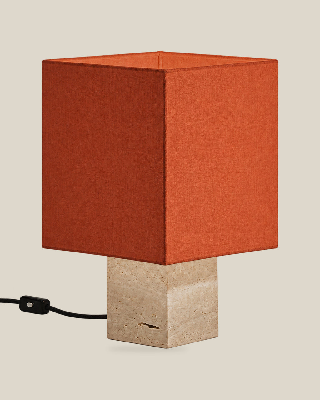 Roma Table Lamp, Small Square, Travertine Beige + Terracotta, on a bone background.