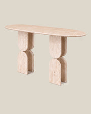 Sculptural Travertine Console Table, elevated three-quarter view on BONE.